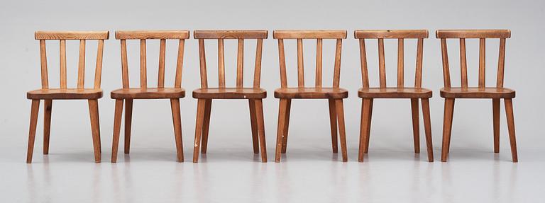 Axel Einar Hjorth, a set of six stained pine 'Utö' chairs, Nordiska Kompaniet, Sweden 1930s.