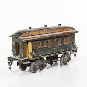 Model train with track and station building, 13 pieces, Germany, 1920s.