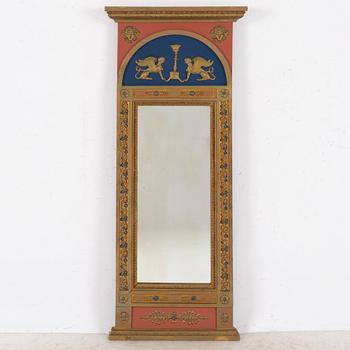 An Empire style mirror, 19th century.