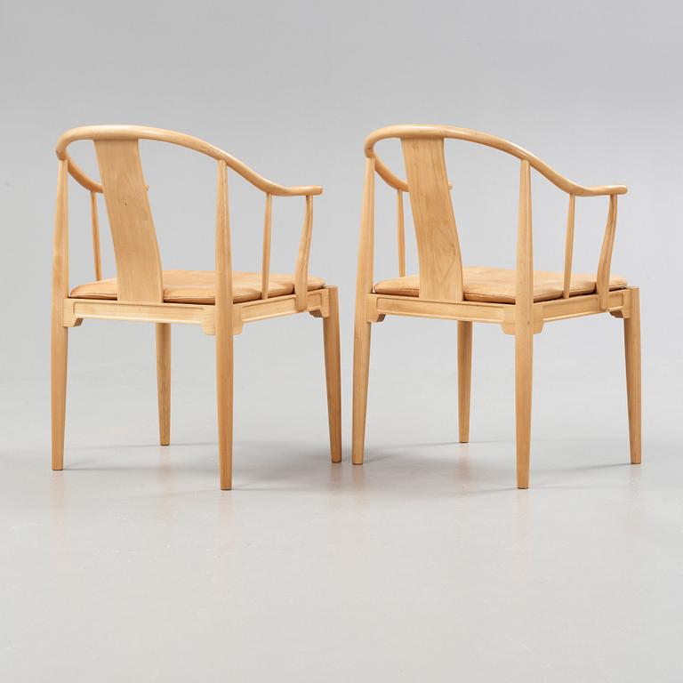 A pair of Hans J Wegner 'China chairs', Fritz Hansen, Denmark 1986-87.