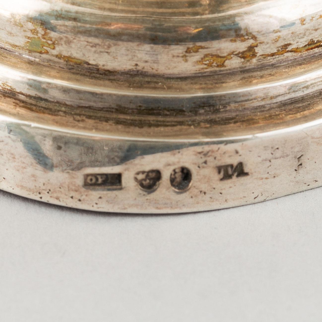 A mixed lot of two 19th century silver and parcel-gilt creamers and a coffee-pot.