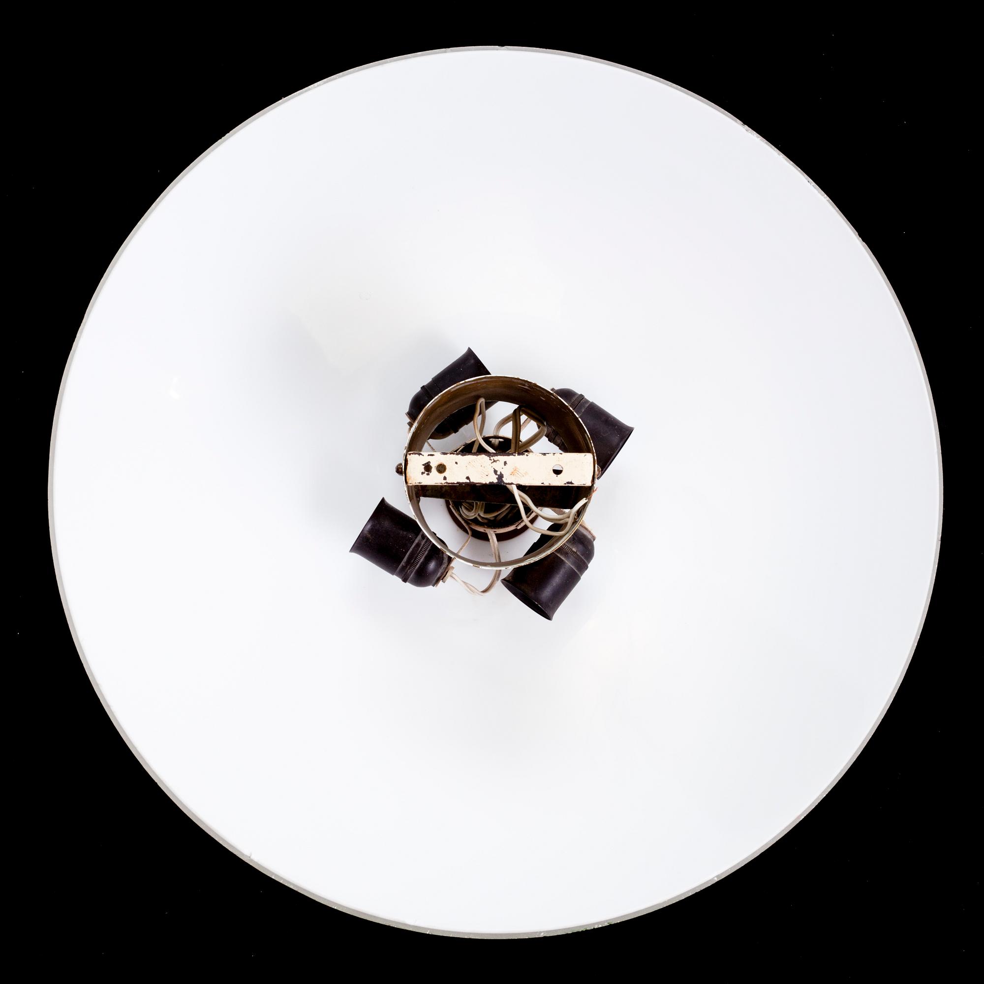 PAAVO TYNELL, kattovalaisin, Idman 1900-luvun puoliväli.