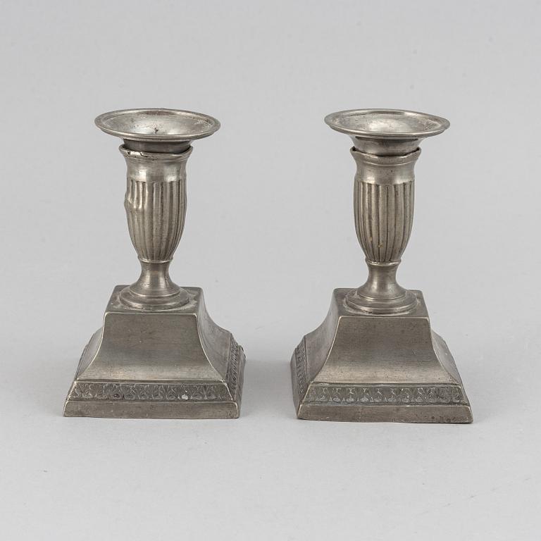 Two pairs of Swedish pewter candlesticks by Erik Wikgren, possibly and Nils Silov, first half of the 19th century.