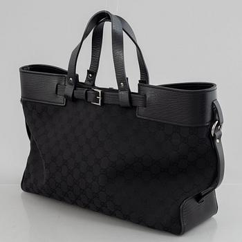 Gucci, A monogram canvas tote bag.