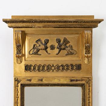 an Empire mirror, Sweden, early 19th century.
