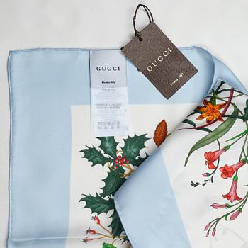 Gucci, a 'Flora' twill silk scarf.