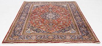 A Keshan rug, c. 222 x 141 cm.