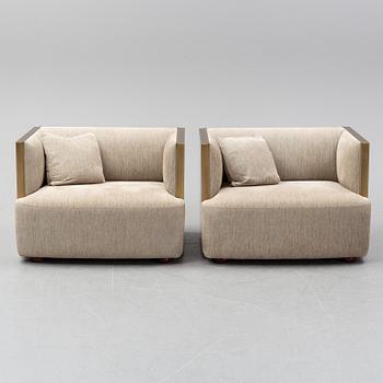 A pair of Promemoria Furniture easy chairs. Italy.
