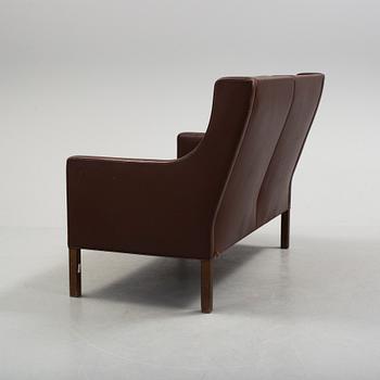 A two-seat leather sofa by Børge Mogensen for Fredrika Stolefabrik, Denmark.