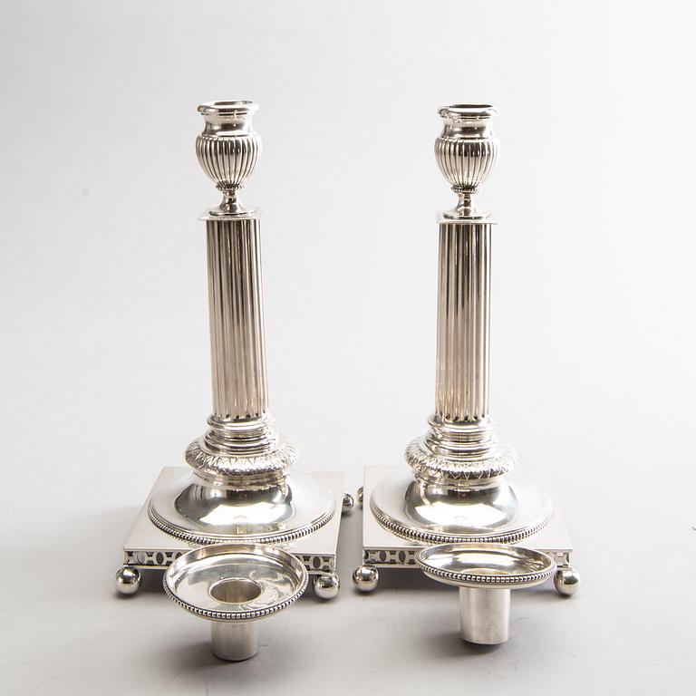 GUSTAF MÖLLENBORG, a pair of silver candlesticks 1902-1903 Stockholm.