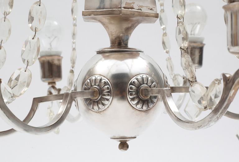 An Elis Bergh silver plated Swedish Grace chandelier, C.G. Hallberg, Stockholm.