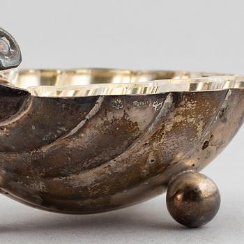 A set of six German parcel-gilt silver 800 salt cellars in fitted case.