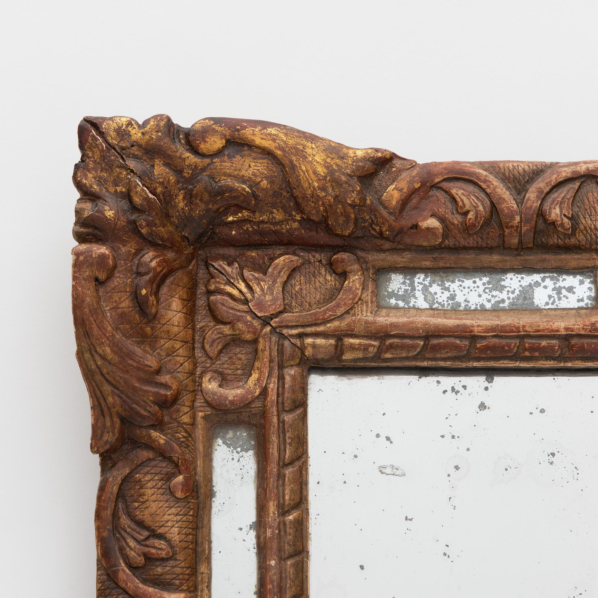 A Baroque mirror, France, 18th Century.
