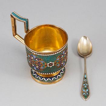 A Russian late 19th century silver-gilt and enameld tea-glass holder, unidentified makers mark, Moscow 1895.