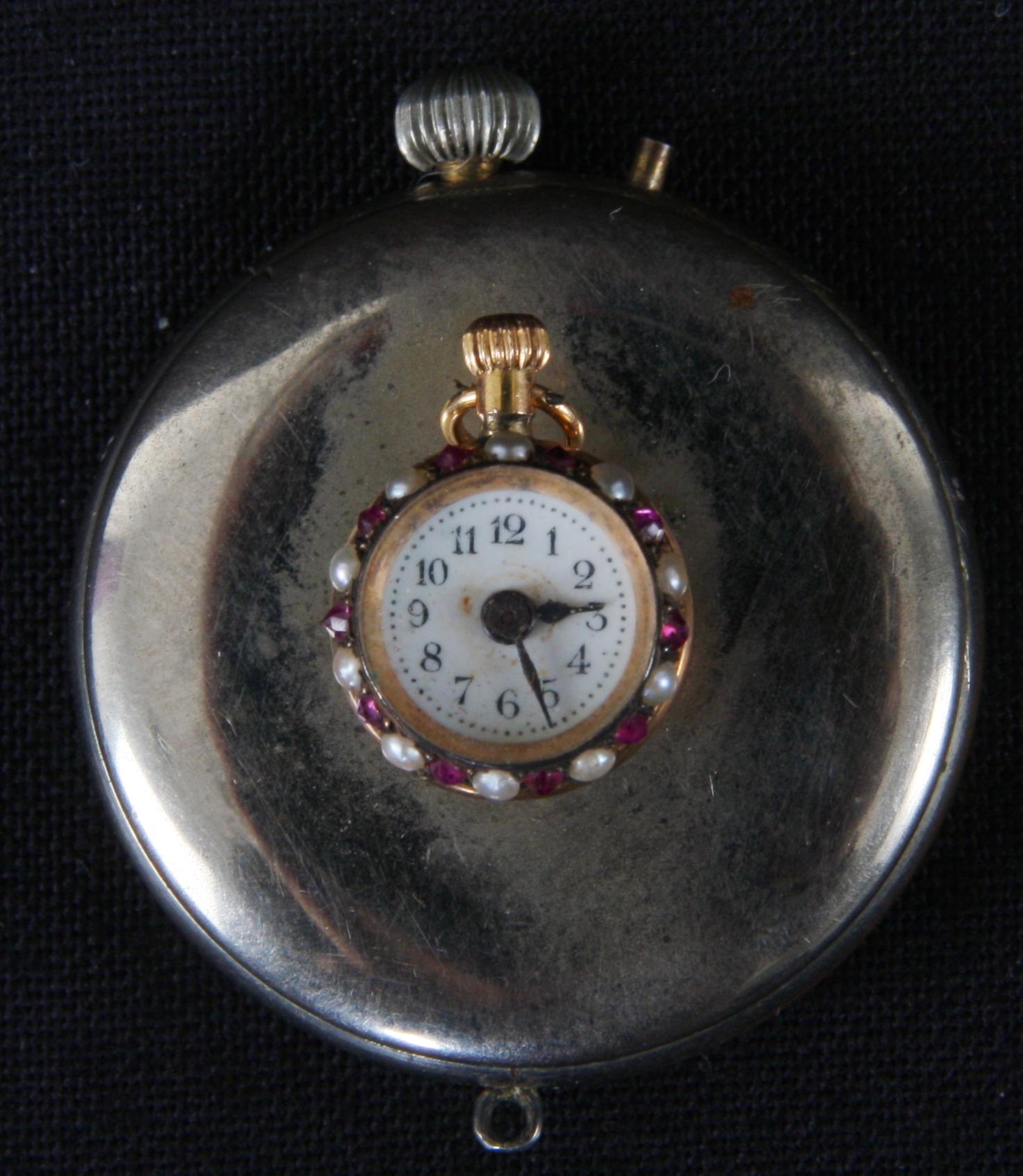 KLOCKA, sk. knapphålsklocka i orginal etui, Albert Barker Ltd, London.