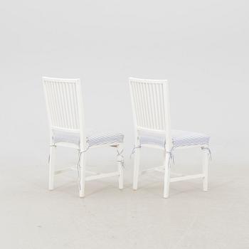 A set of 10 painted Gustavian style chairs from IKEA later part of the 20th century.