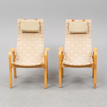 A pair of 'Primo' easy chairs by Yngve Ekström, for Swedese.