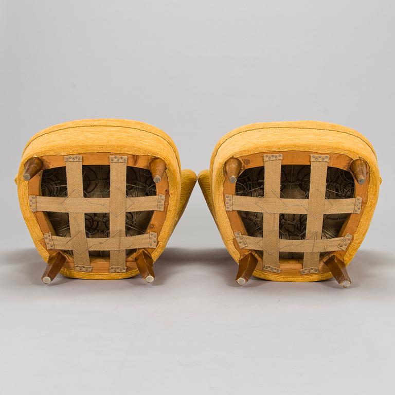 A pair of armchairs, mid-20th century.