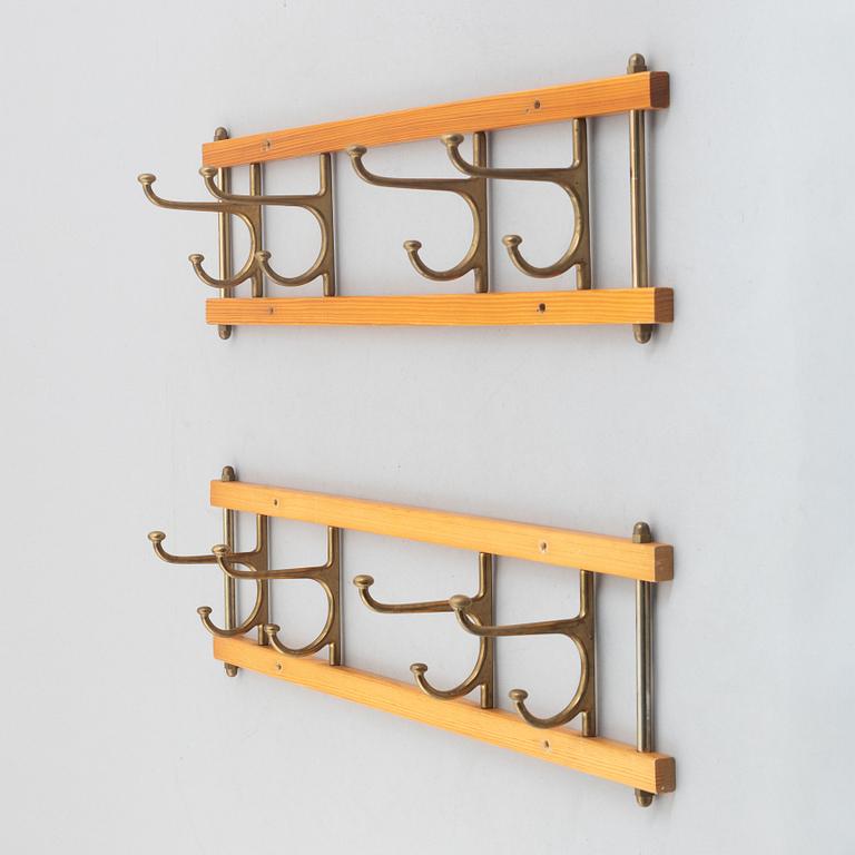 A pair of 'Dekorativ' coat hangers, Skoglunds metallgjuteri, Anderstorp, 1950's/60's.