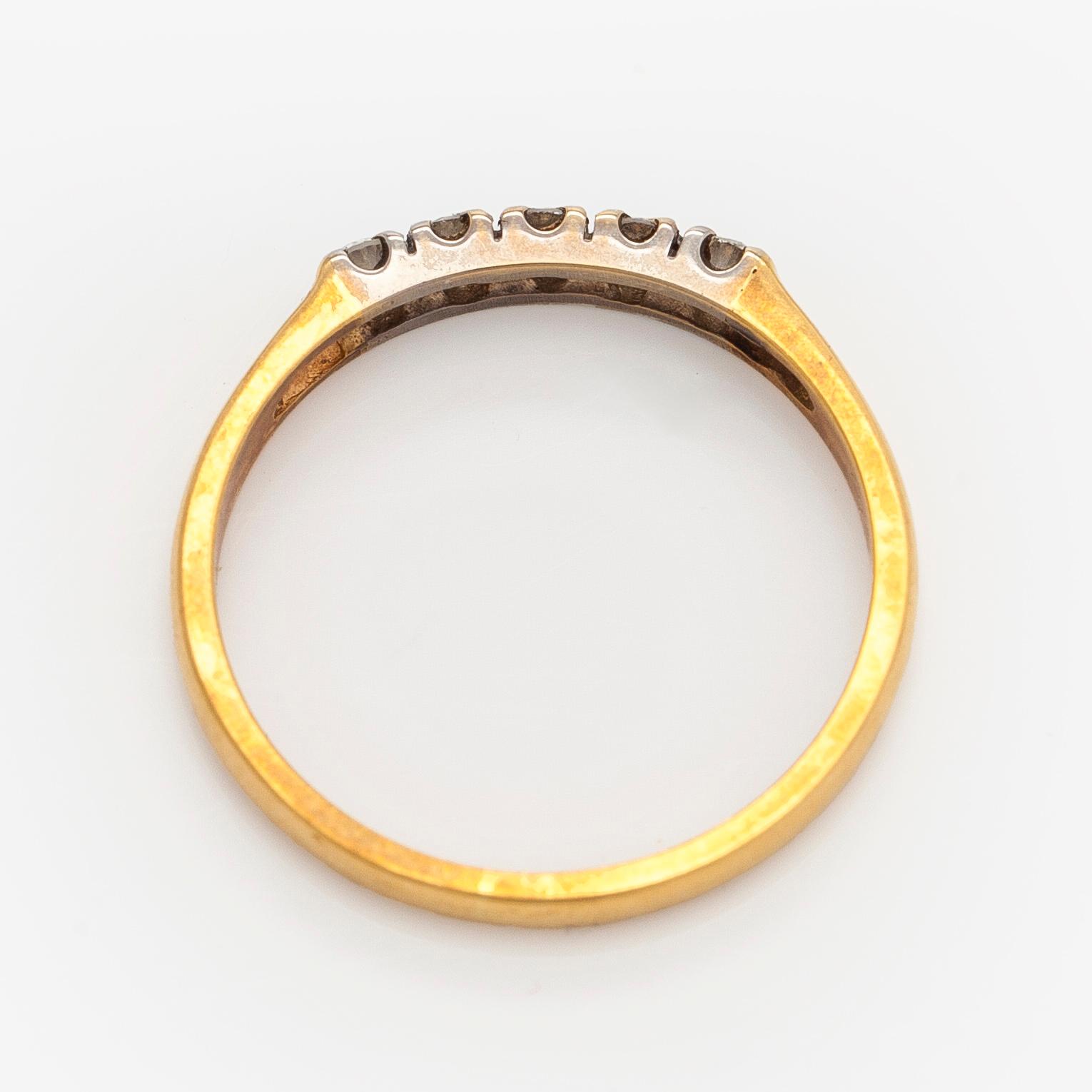 Ring, briljantslipade diamanter, 18K guld. Helsingfors 1991.