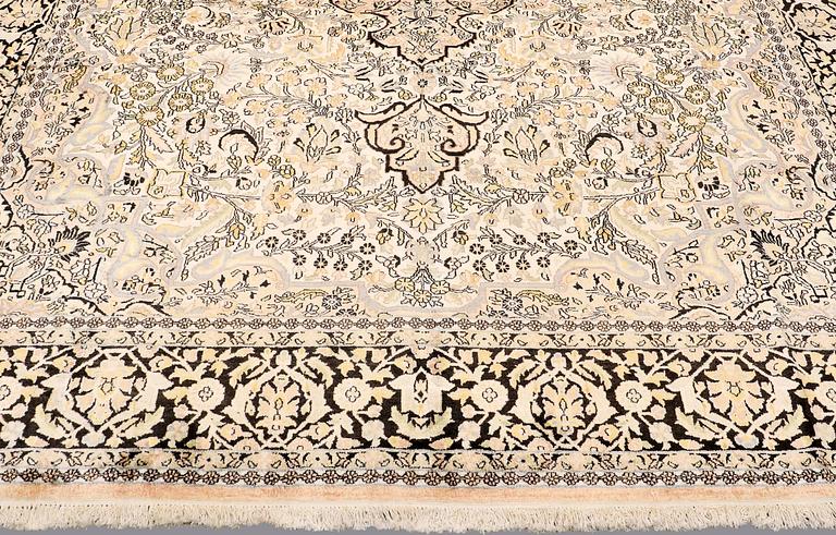 A CARPET, old silk Kashmir, ca 380 x 274 cm.