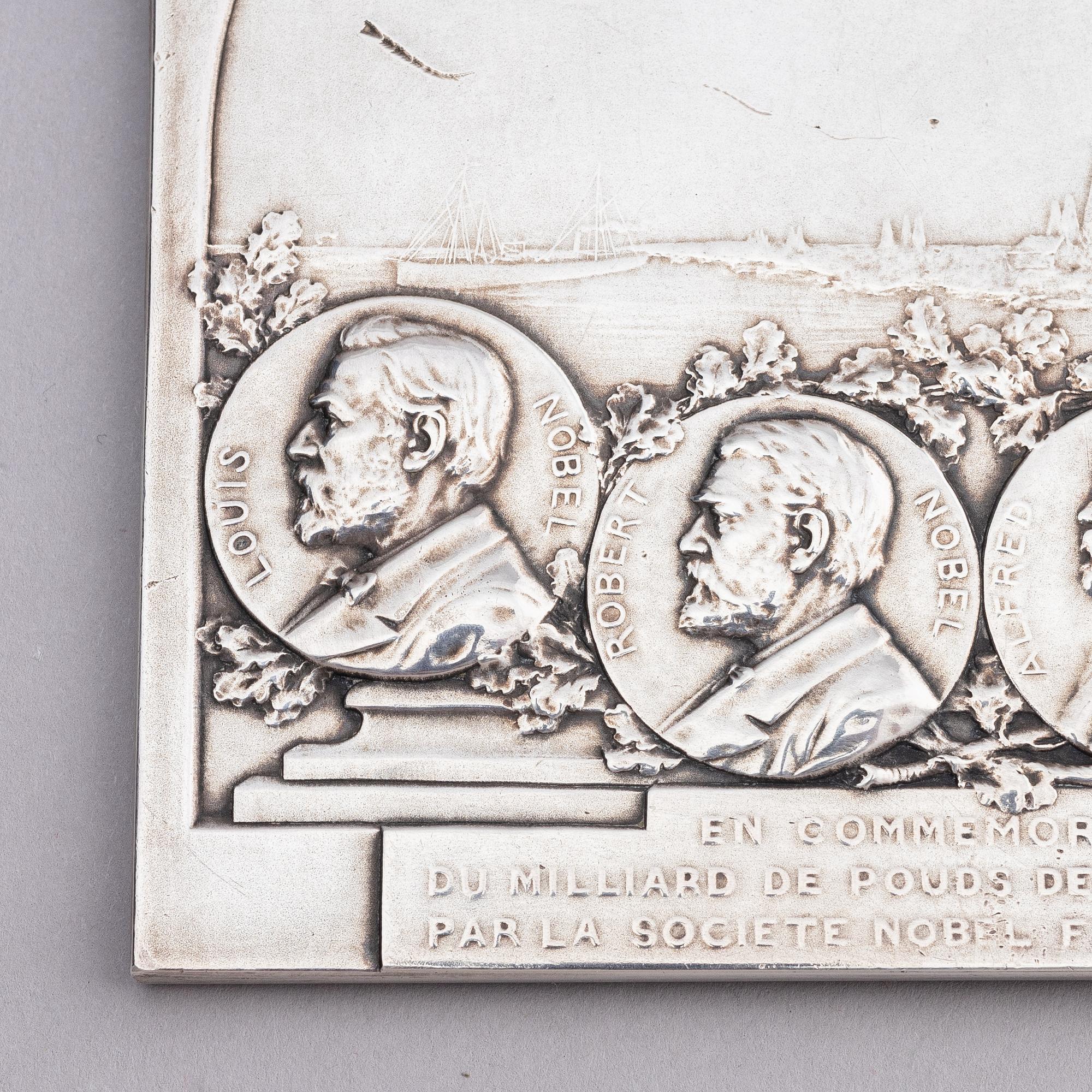 A Nobel commemorative silver plaque, marked Henri Varenne, Paris 1907.