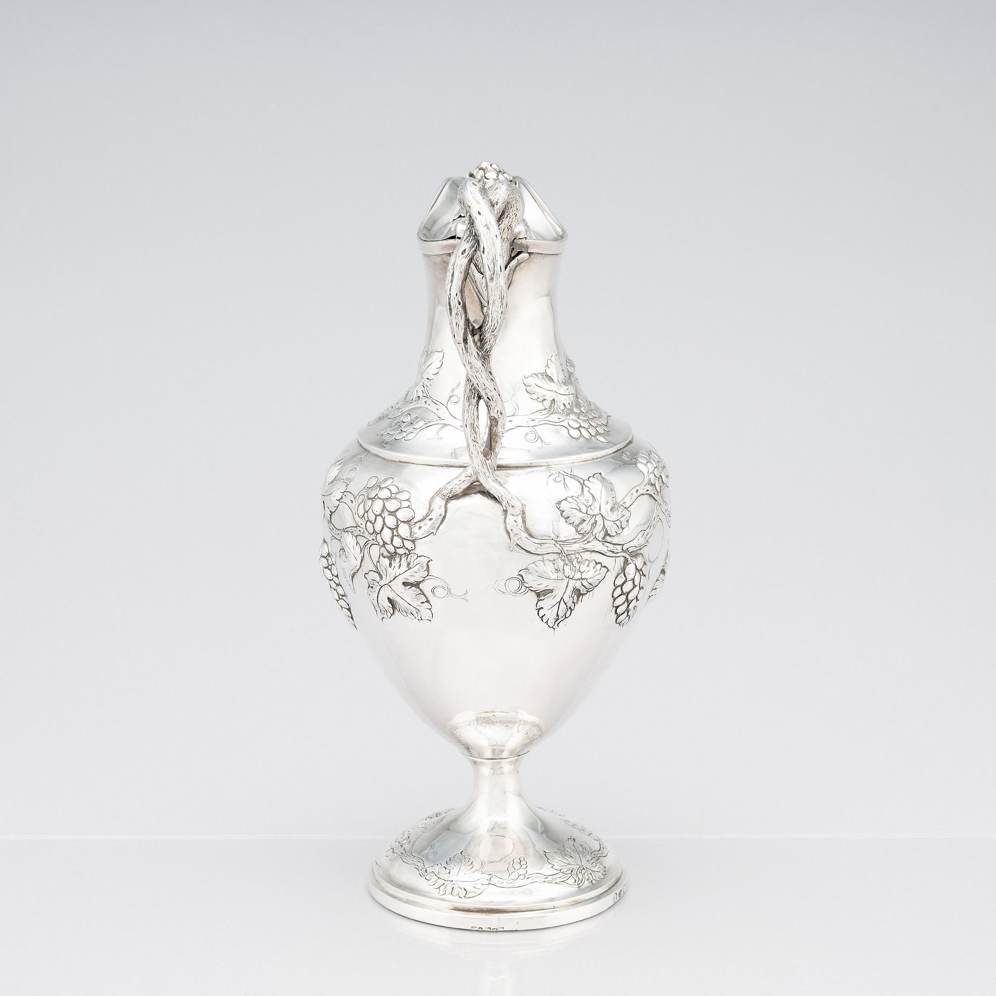 A George III sterling silver ewer, marks of John Scofield, London 1787.