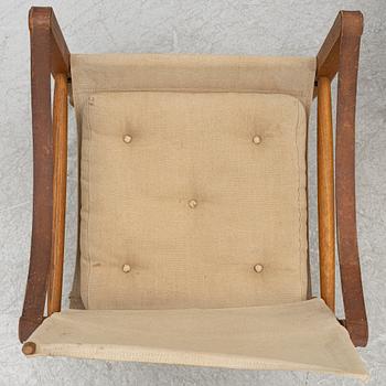 Kaare Klint, A pair of 'Safari' armchairs, Rud. Rasmussen's Snedkerier, Denmark, second half of the 20th century.