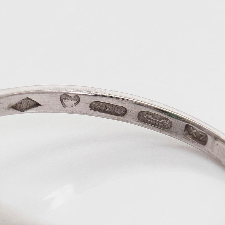 RING, fasettslipad turmalin, åttkantslipade diamanter, 18K vitguld. A. Tillander, Helsingfors 1975.