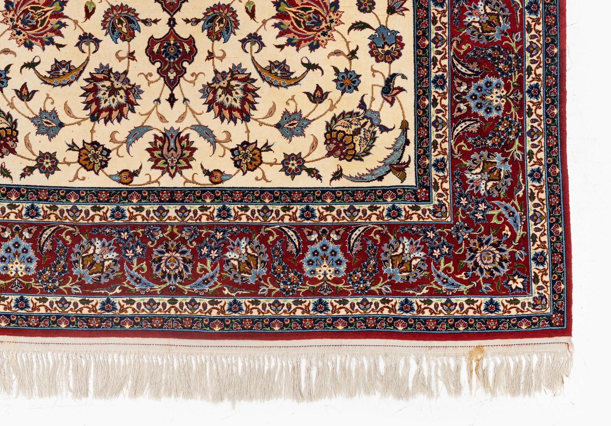 A semi-antique Isfahan rug, c. 225 x 143 cm.