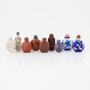 Nine snuff bottles, Peking glass, lacquer, stone and mother of pearl, China, 20th century.