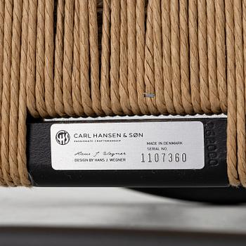 Hans J. Wegner, a model CH-24/'Wishbone' chair, Carl Hansen, Denmark, 21st century.