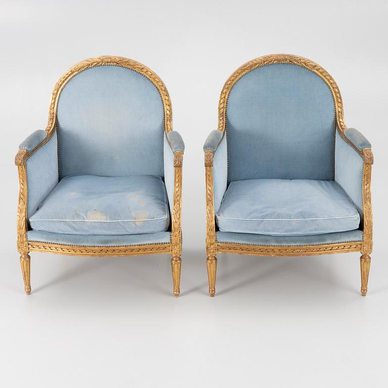 A pair of easy chairs, Louis XVI style, 20th century.