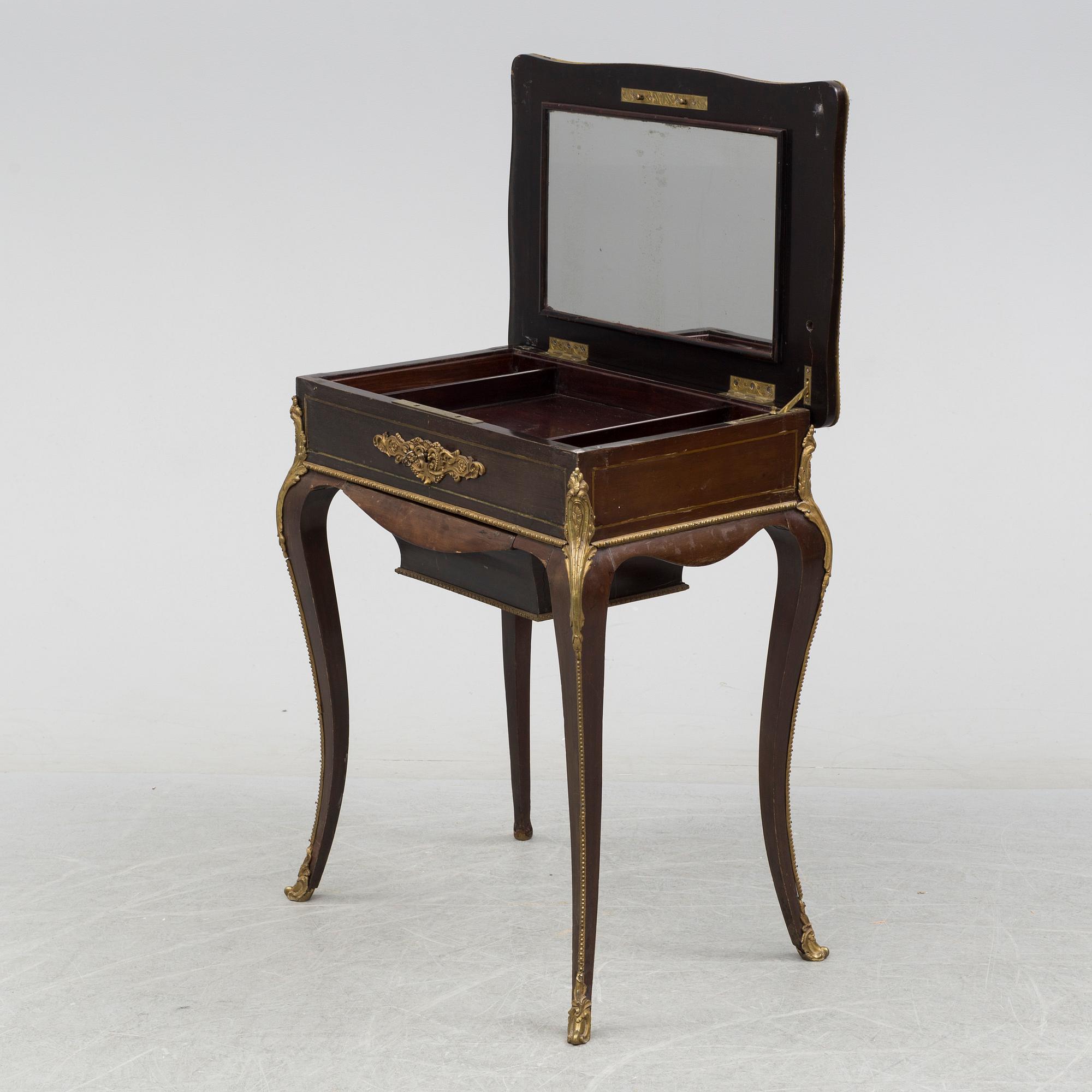 A late 19th century sewing table.