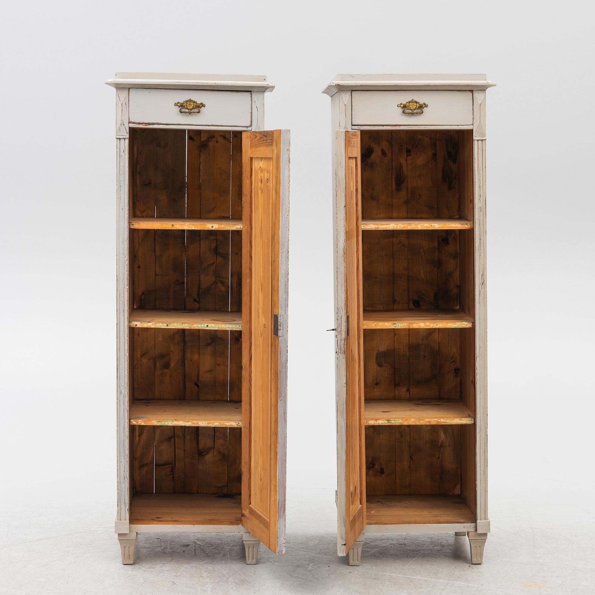 A pair of column cabinets, circa 1900.