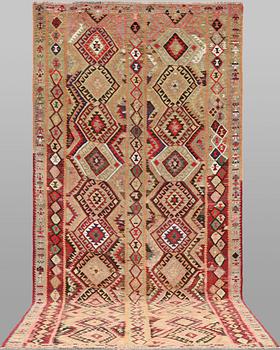 A Nomad Kelim Kord carpet, 387 x 185 cm.