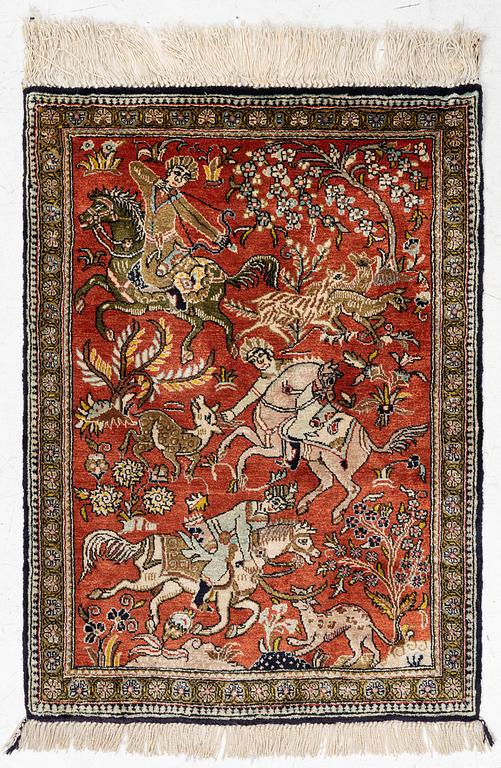 A Ghom figural silk rug, c. 77 x 55 cm.