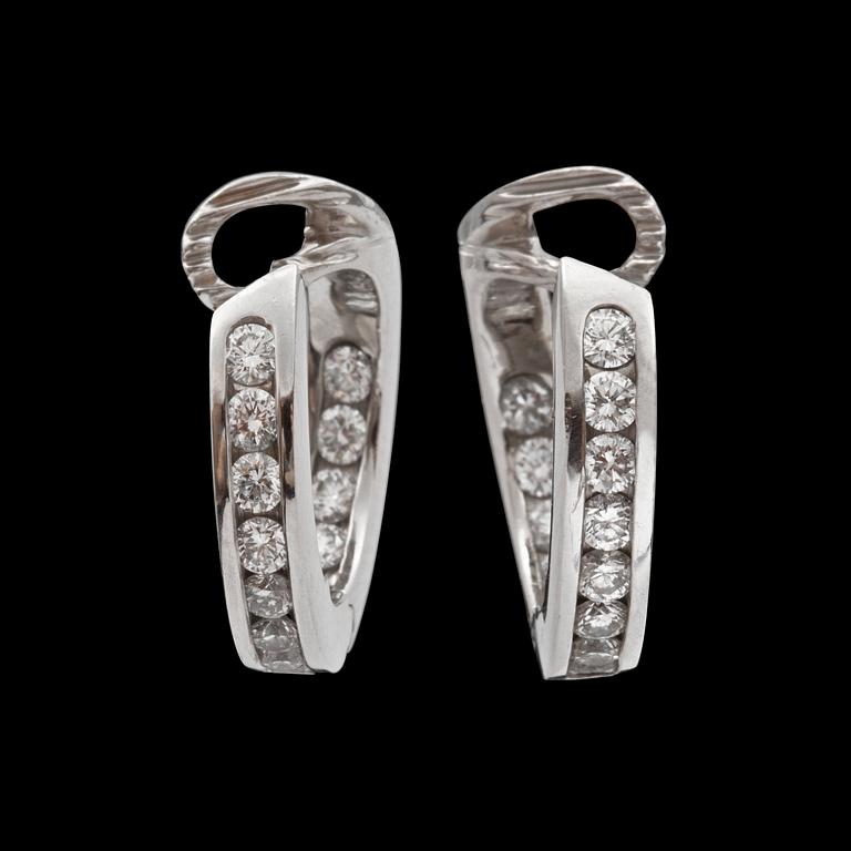 A pair of Tiffany & Co brilliant-cut diamond earrings. Total carat weight circa 0.75 ct.