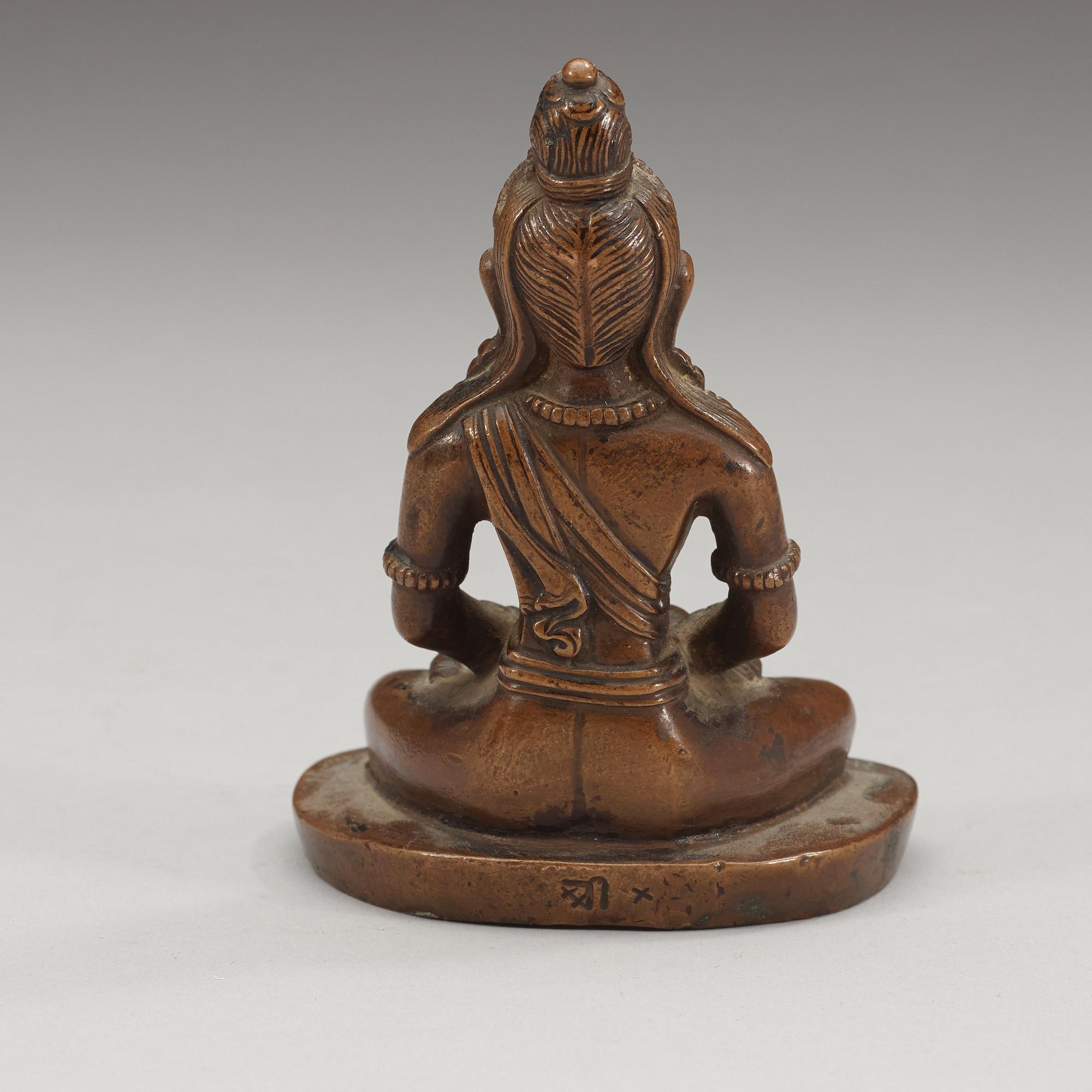 A copper alloy figure of Amitayus, Tibet/Nepal, presumably late 19th century/early 20th century.