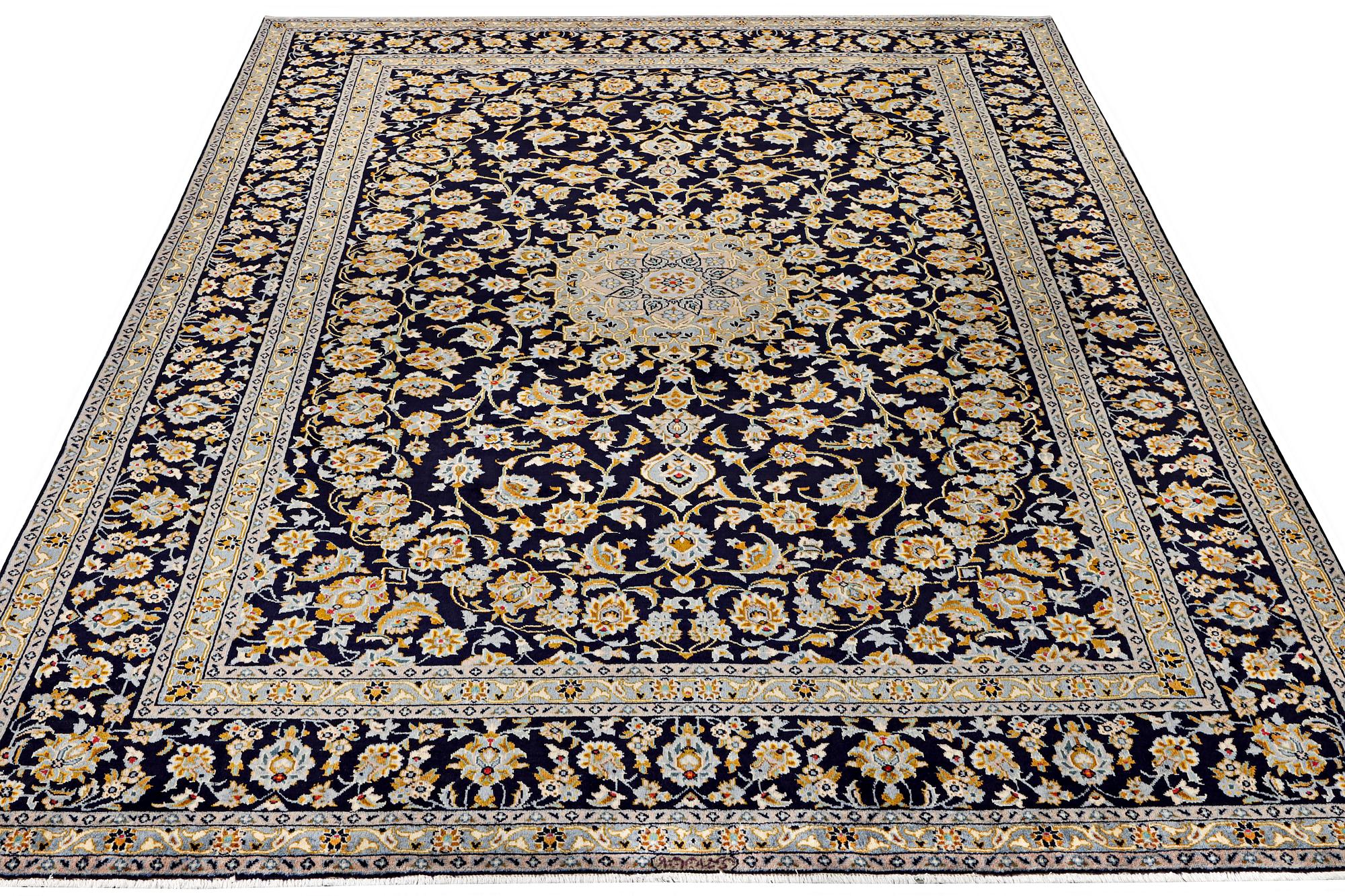 A Keshan carpet, c. 365 x 259 cm.