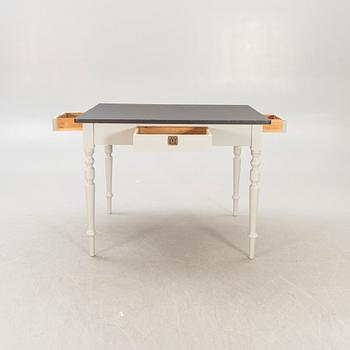 A painted working table later part of the 19th century.