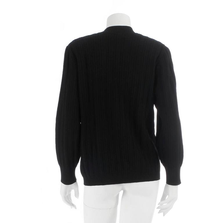 CÉLINE, a black wool cardigan, size 40.