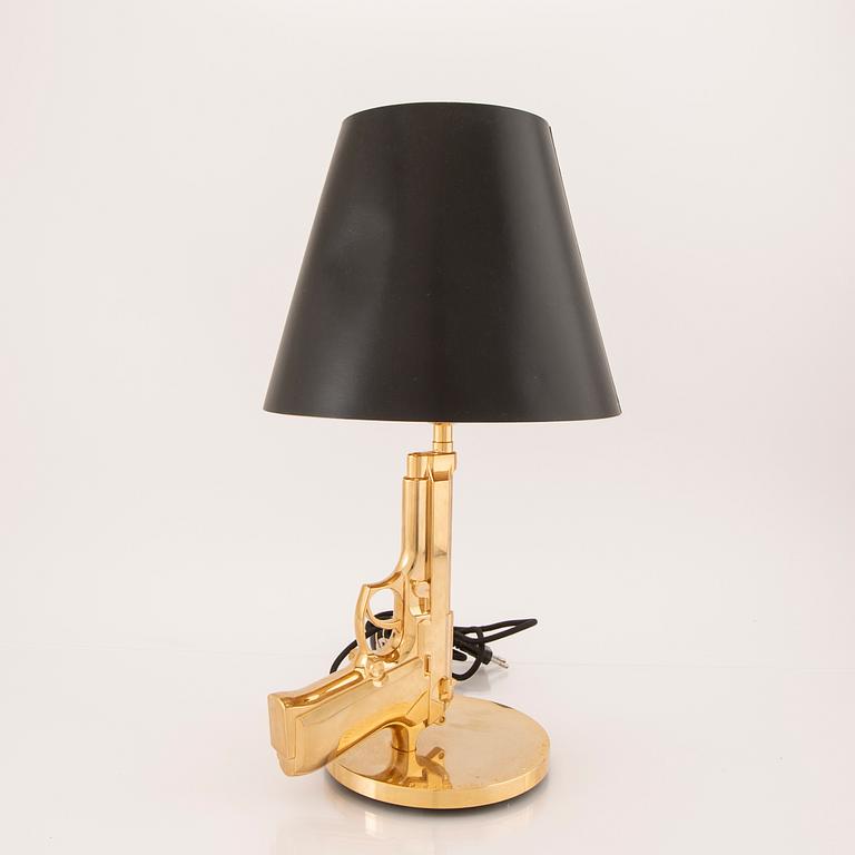 Philippe Starck, bordslampa, "Gun bedside Lamp", Flos, Italien.