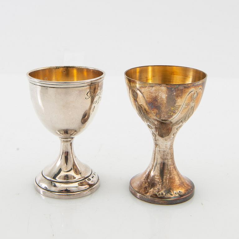 Egg cup with spoon and odd egg cup silver Swedish import marks.