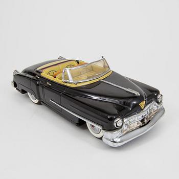 A Nomura Toys Cadillac Japan 1950s.