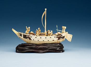 A Japanese ivory model of a ship with fishermen, Meiji period ca 1900.