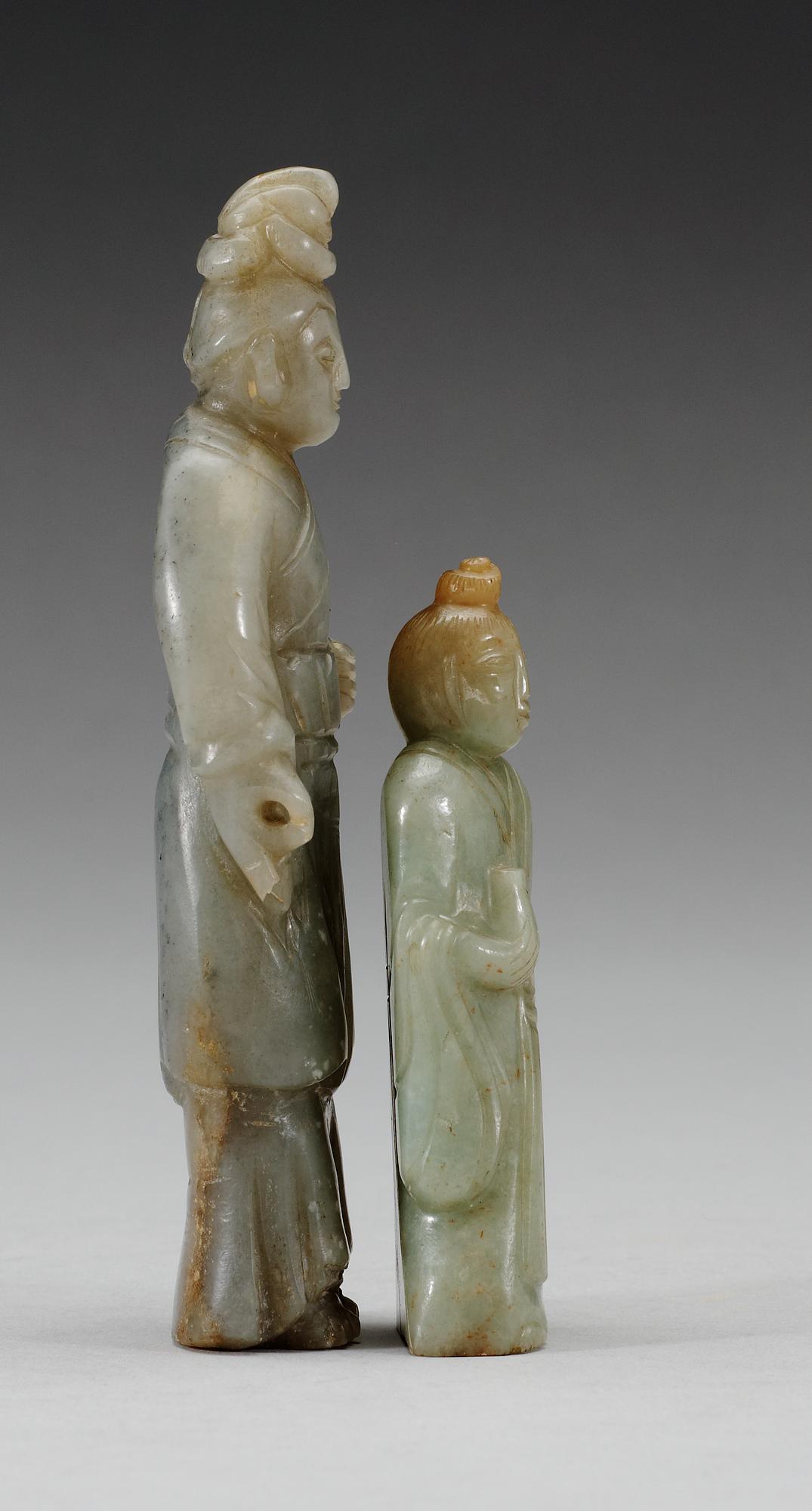 Two carved nephrite figures, late Qing dynasty.
