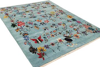 An oriental carpet, a. 370 x 261 cm.