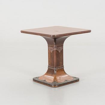 A mahogany veneered Art Nouveau table, early 20th century.