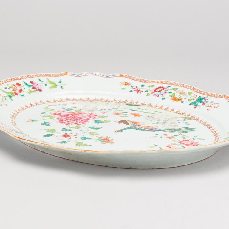 A famille rose 'double peacock' serving dish, Qing dynasty, Qianlong (1736-95).